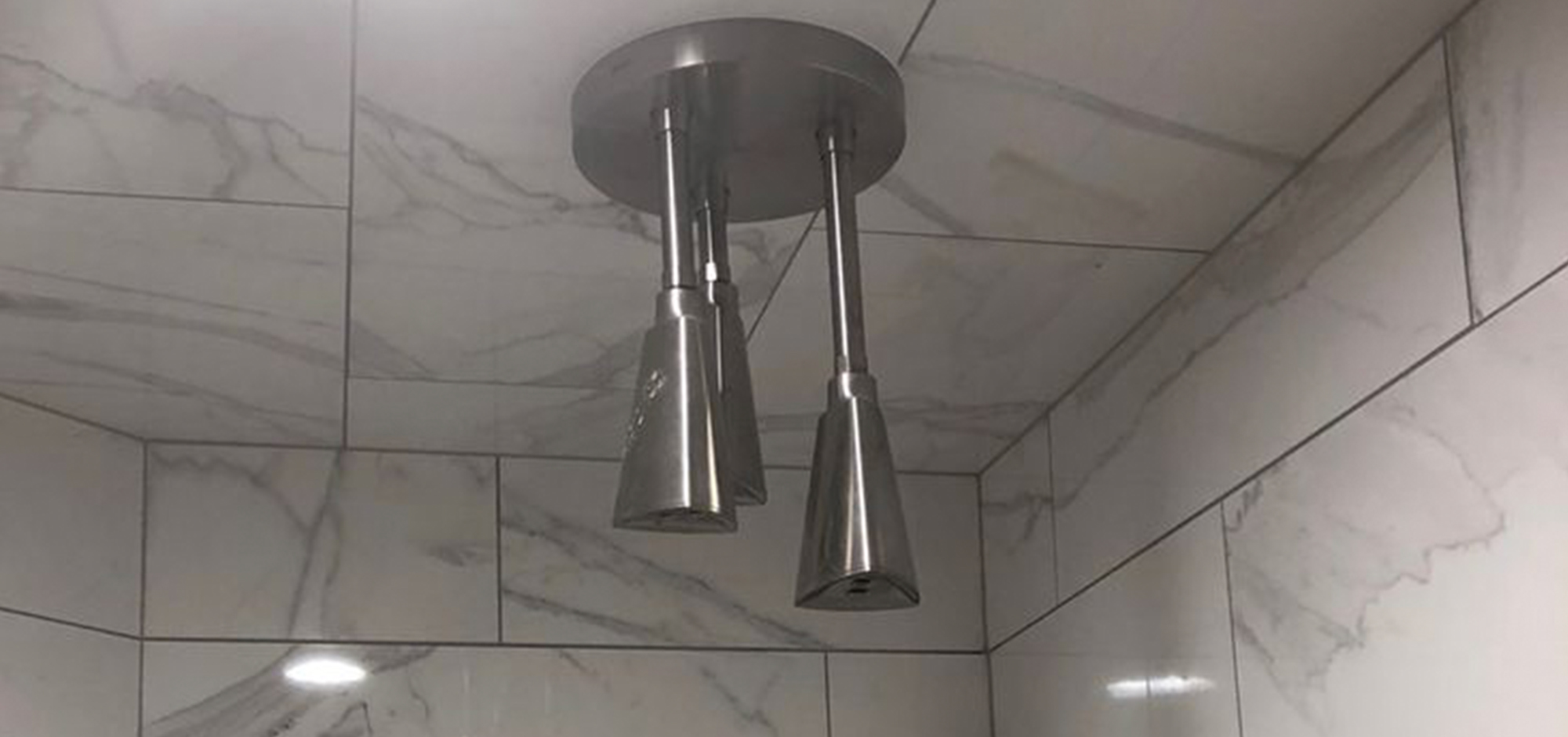 Shower faucet fixtures by Merritt Plumbing & Heating